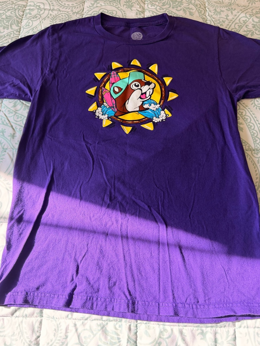Purple Graphic Tee with Surfing Cartoon Sun